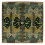 Folk-inspired rectangular rug with intricate botanical designs in vibrant colors.