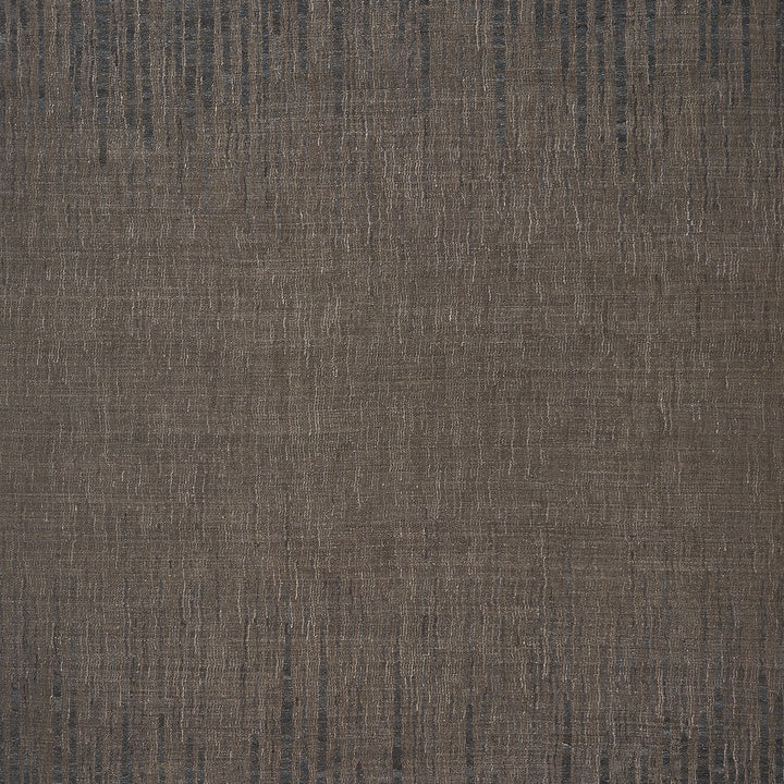 Close-up of textured fabric showcasing intricate detail and rhythmic pattern.