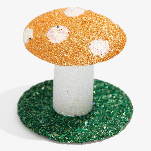 Sparkly gold and white mushroom craft decoration with whimsical design