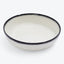 Minimalist ceramic bowl with handcrafted black border for versatile use.