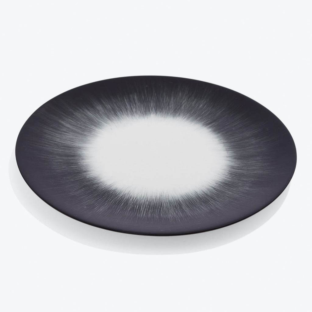 Modern designer plate with a striking gradient, exuding contemporary elegance.