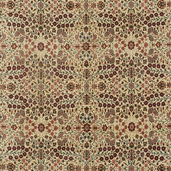 Intricate, symmetrical fabric with floral motifs in traditional colors.