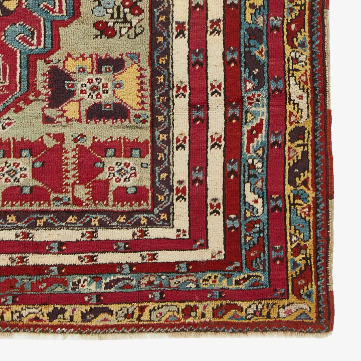 Close-up of a vibrant, hand-woven Middle Eastern carpet's intricate patterns.