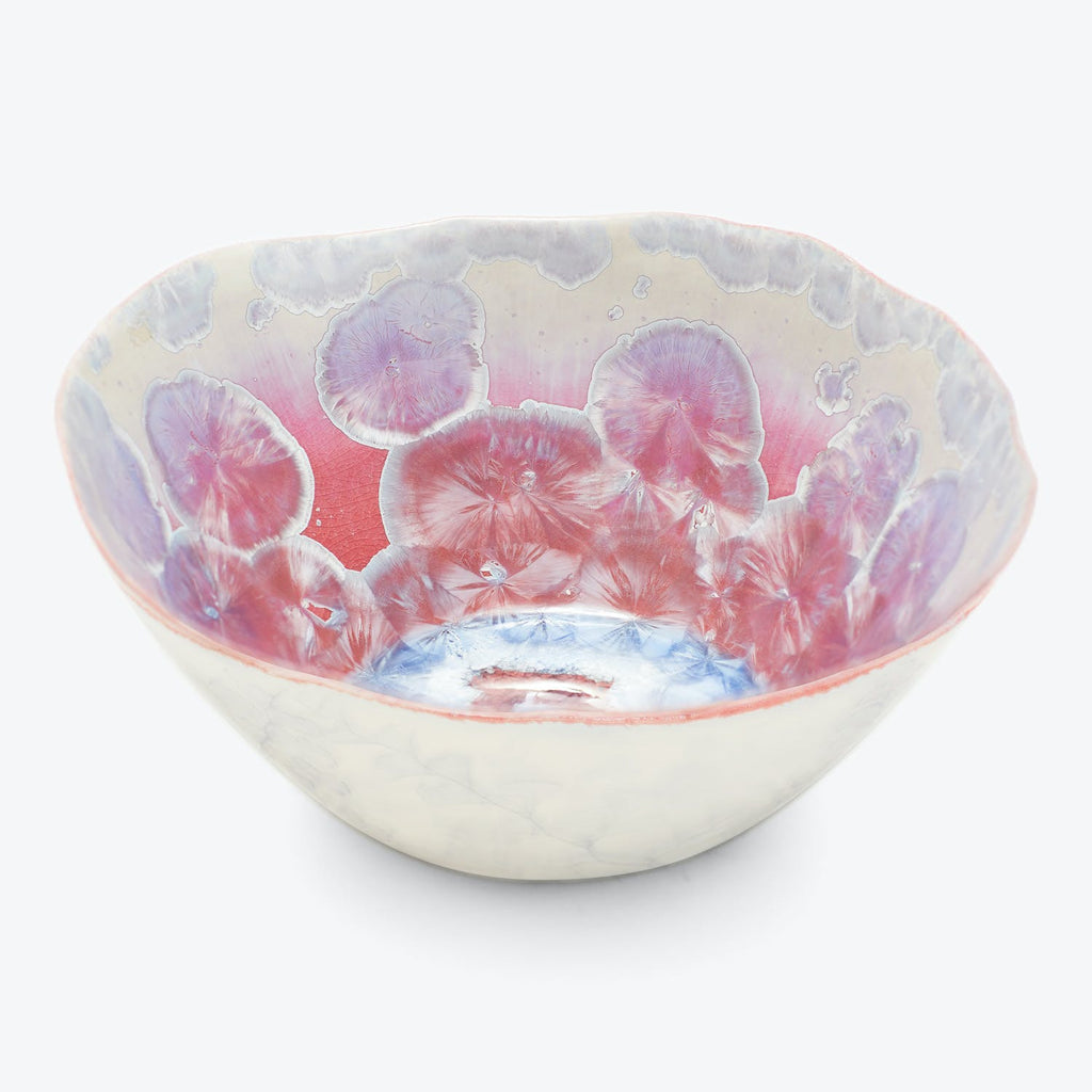 Decorative ceramic bowl with floral design in pink and blue