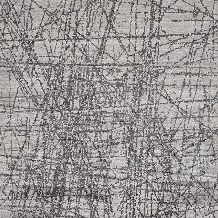 Close-up of an intricate, abstract pattern on textured fabric.