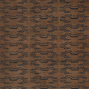 Close-up of a dark brown fabric with blue geometric pattern.
