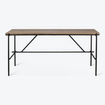 Minimalist, modern table with a warm-toned wooden tabletop and sleek metal frame.