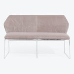 Modern-style loveseat with curved backrest and sleek metal frame.