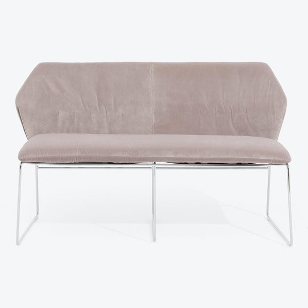 Modern-style loveseat with curved backrest and sleek metal frame.