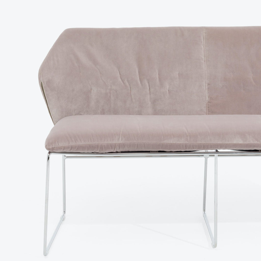 Minimalist modern-style sofa with sleek chrome frame and soft upholstery.