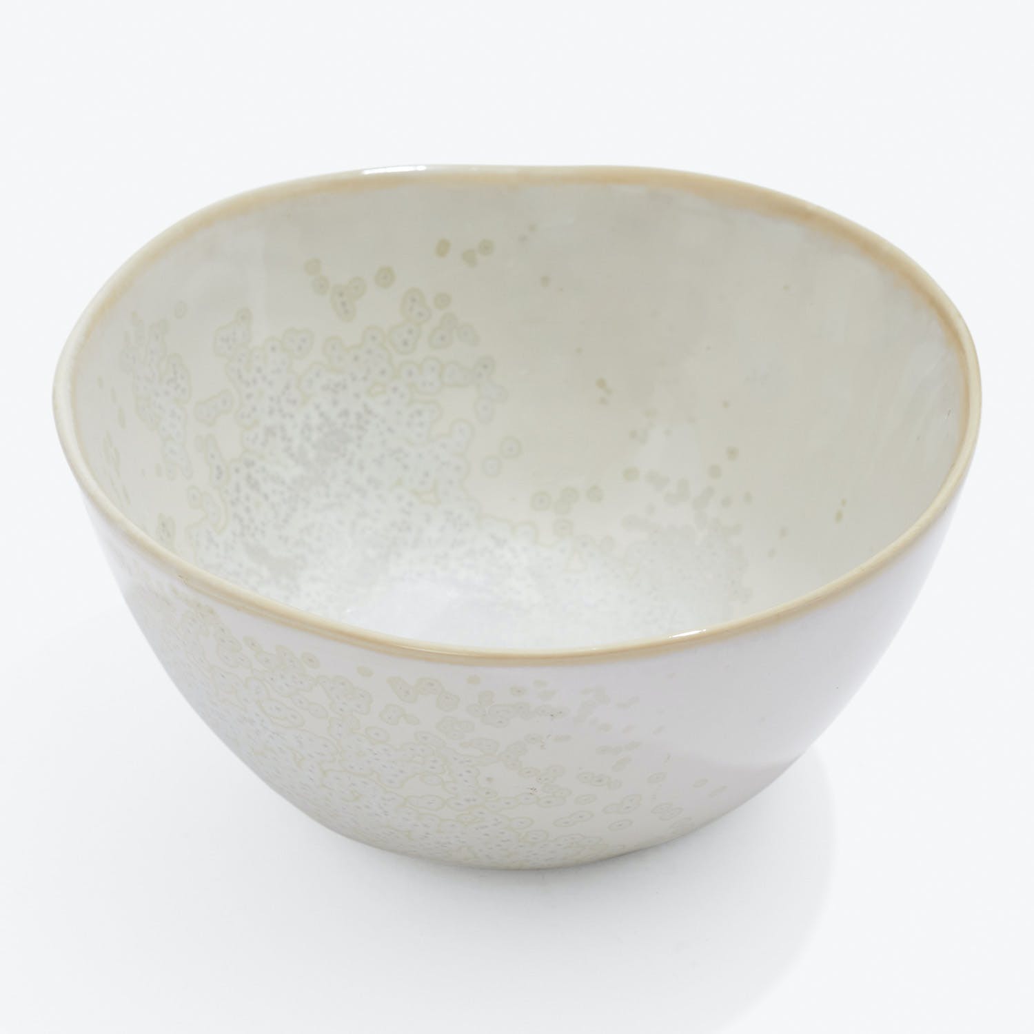 Minimalist ceramic bowl with delicate speckles and elegant gold trim