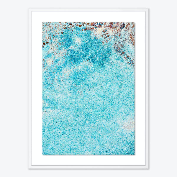 Abstract artwork with dynamic blue hues, resembling ocean water texture.