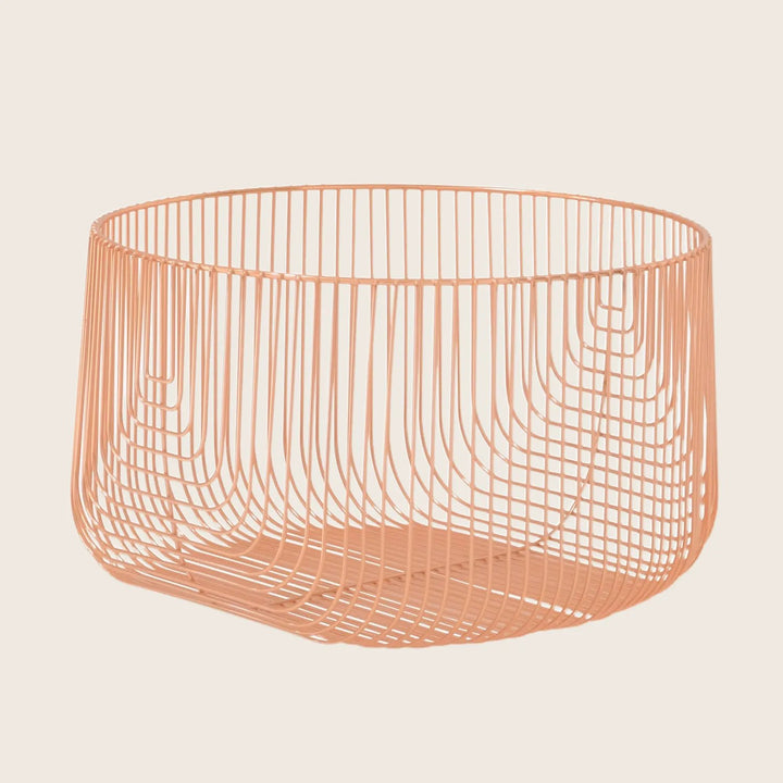 3D rendering or photograph of a copper wireframe basket, empty.