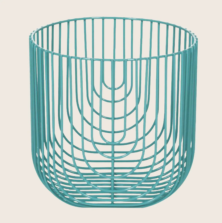 Teal wire basket with open design, suitable for multiple purposes.