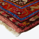 Close-up of a colorful, intricately designed high-quality rug with texture.