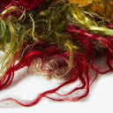 Colorful fibers or threads with texture and dimension, possibly used for crafts or art projects.