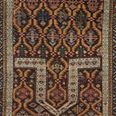 Exquisite handcrafted rug with intricate traditional patterns and rich colors.