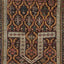 Exquisite handcrafted rug with intricate traditional patterns and rich colors.