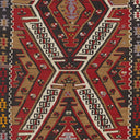 Exquisite traditional handwoven rug showcases intricate geometric motifs and symbols.