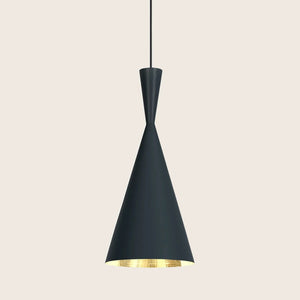 Modern pendant light with black cone-shaped lampshade and gold interior.