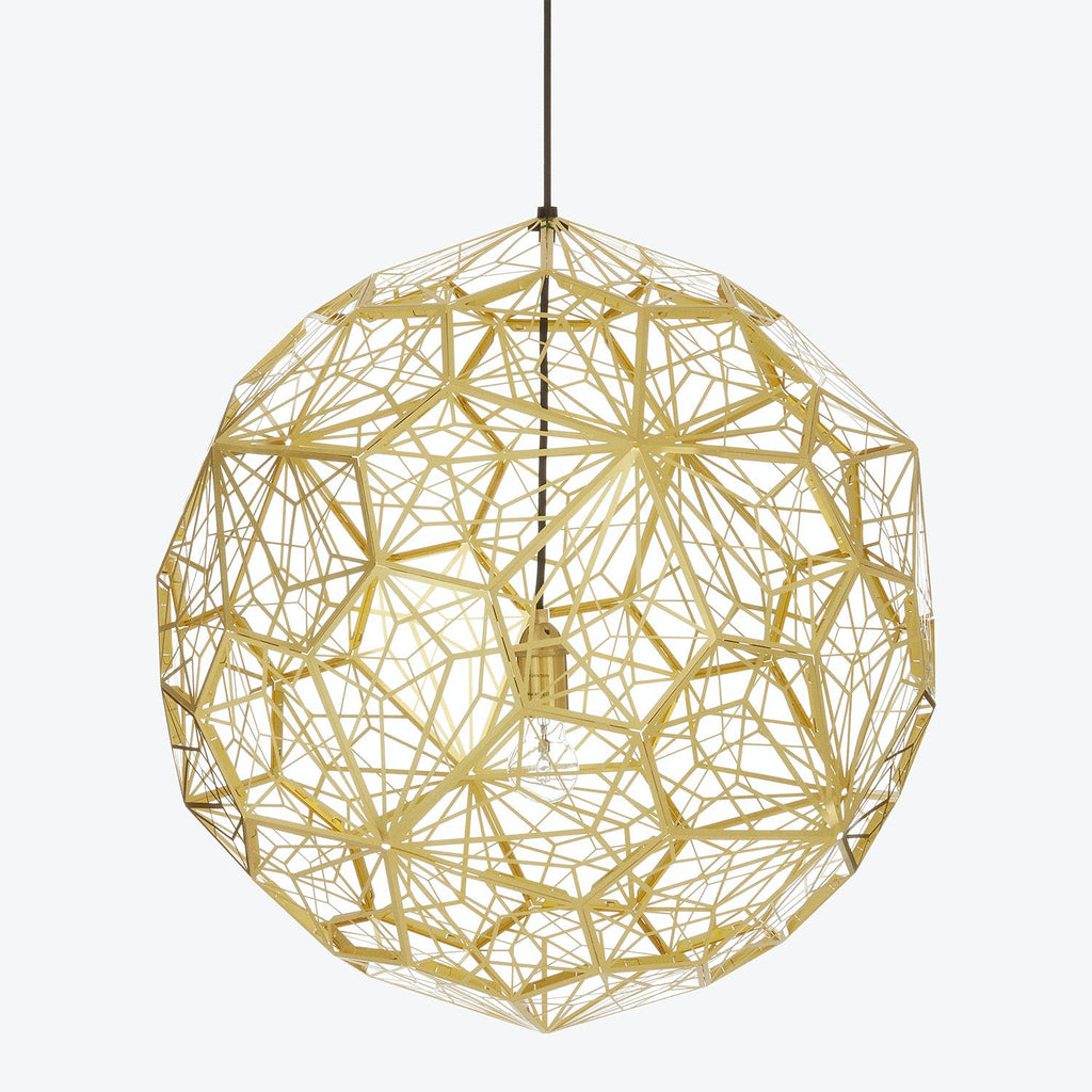 Stunning golden pendant light with intricate geometric metalwork design.