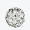 Sleek and modern pendant light fixture with intricate geometric design.