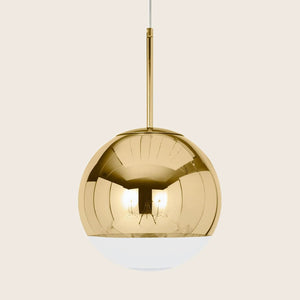 Contemporary pendant light fixture with gold reflective upper half.