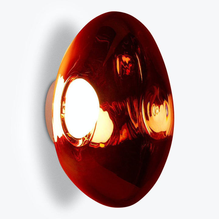 Abstract, modern red object emits bright light from spherical cut-out