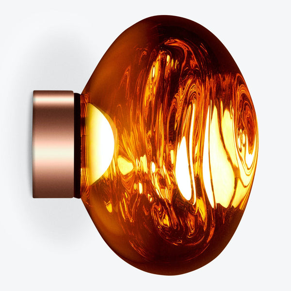 Modern, decorative light bulb with swirling design emits warm ambiance.