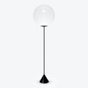 Modern black floor lamp with white sphere shade exudes elegance.