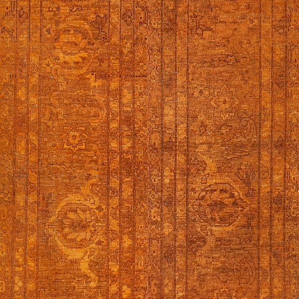 Close-up of worn, aged wooden surface with prominent grain patterns.