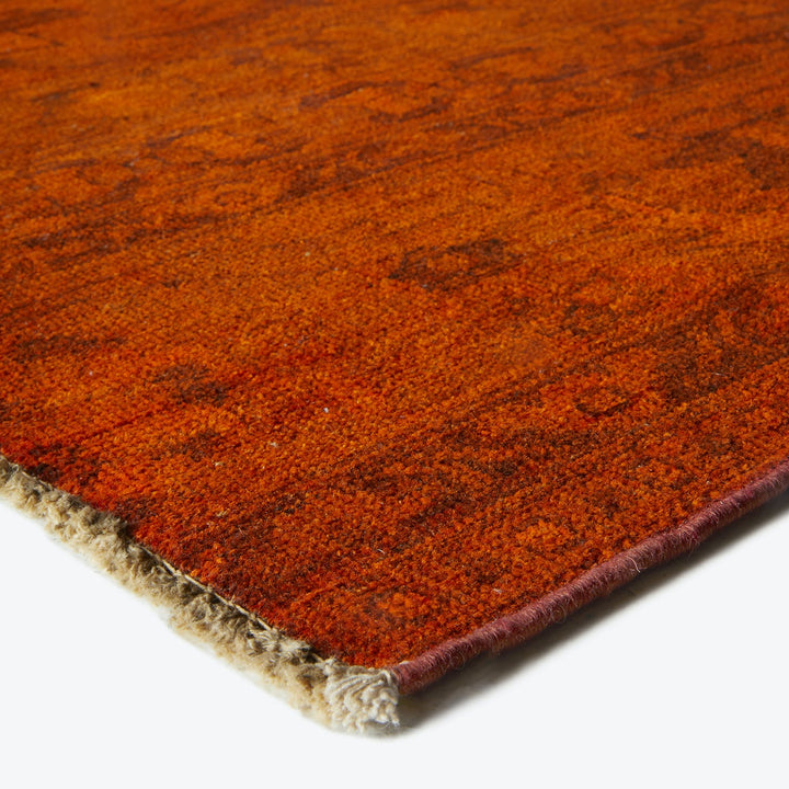 Close-up of a high-quality, textured rug with rich color variations.