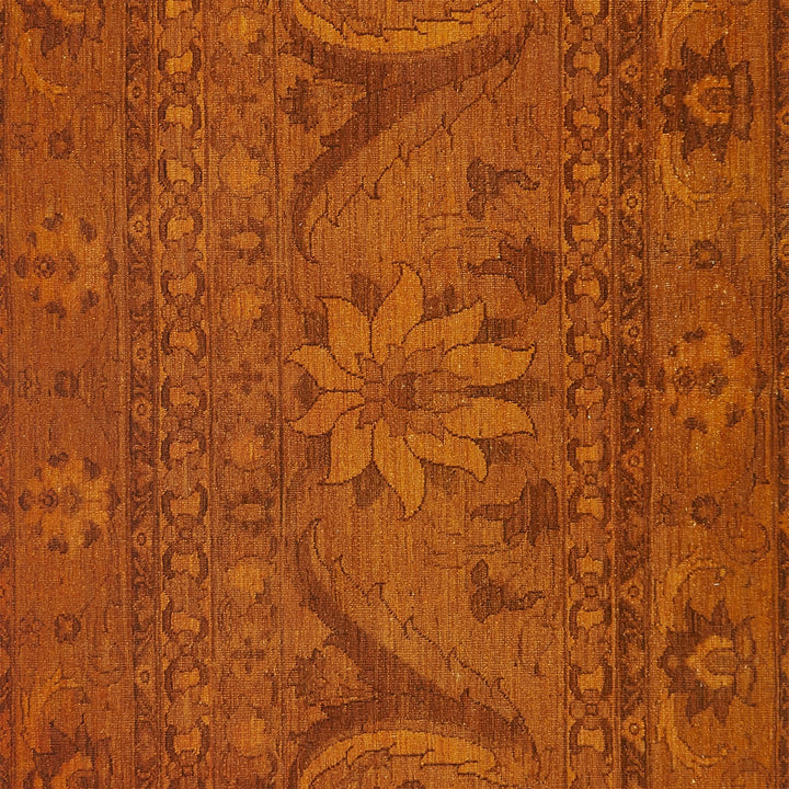An ornate wooden panel with floral motifs and intricate patterns.