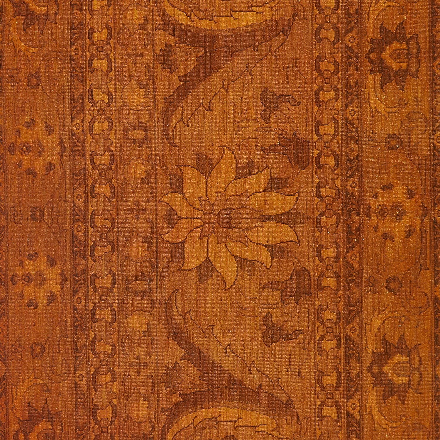 An ornate wooden panel with floral motifs and intricate patterns.