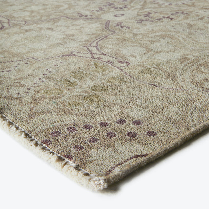 Close-up view of a textured rug displaying various colors and patterns.
