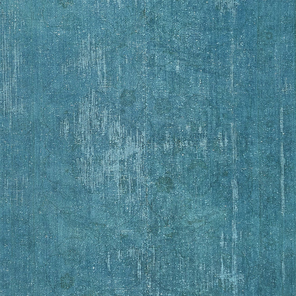 Close-up of a textured surface with blue hues and linear disturbances.