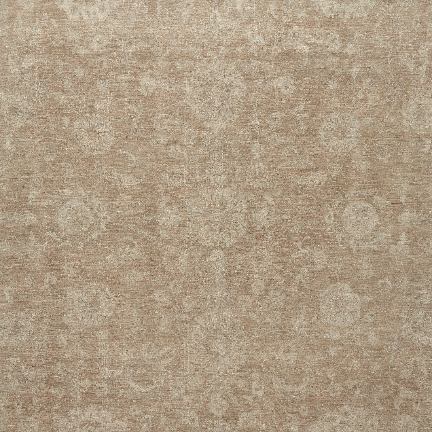 Symmetrical and ornate floral patterned fabric in muted beige color.