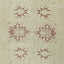 Elegant vintage rug with symmetrical burgundy designs, inspired by Oriental motifs.
