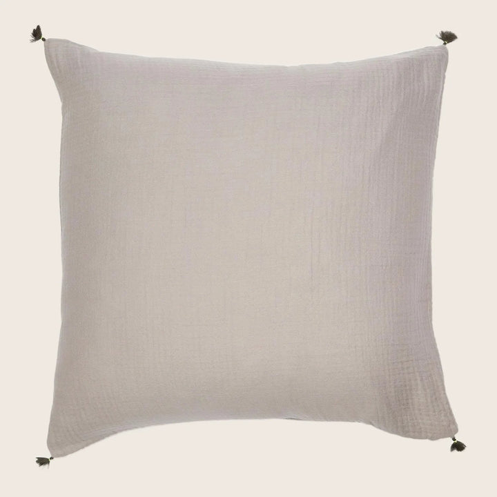 Square decorative pillow with off-white color and delicate woven pattern.