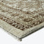 Vintage-inspired rug with detailed pattern and soft plush surface.