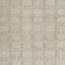Patterned fabric with repeating circular medallions in muted vintage style.