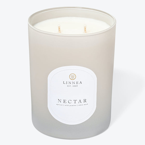 LINNEA candle in frosted glass container with NECTAR fragrance.