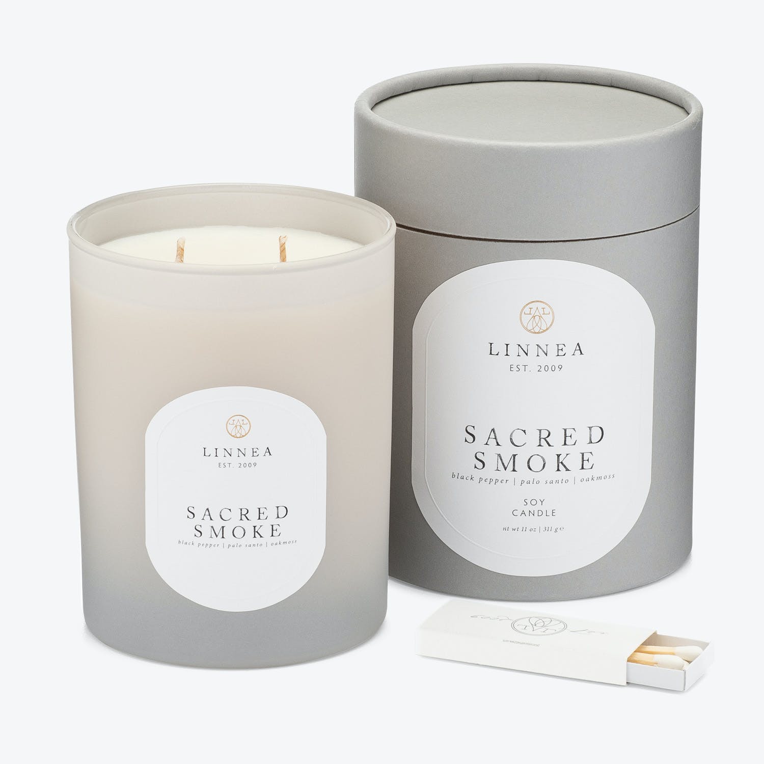 LINNEA EST. 2009 luxury scented candle and matching packaging