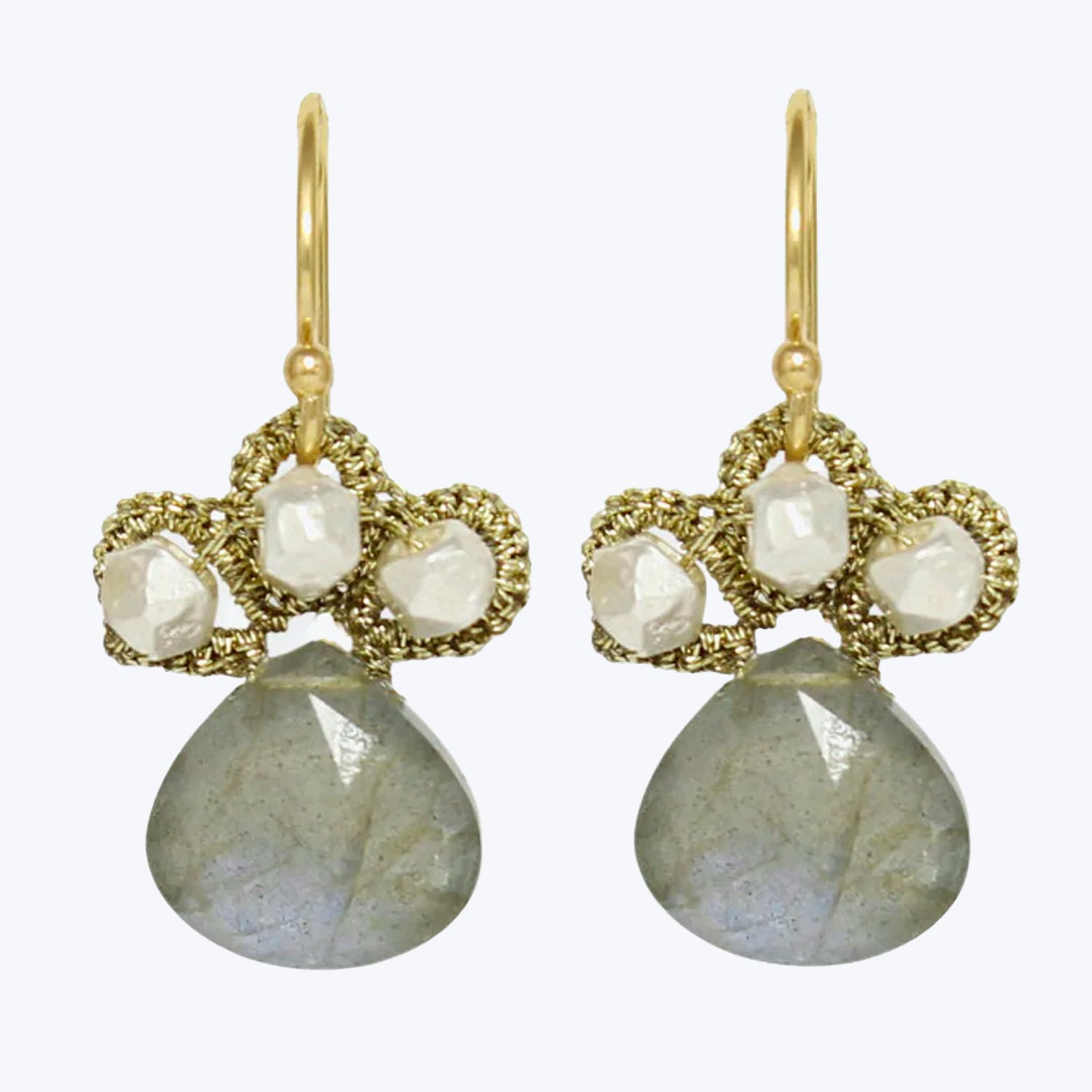 Elegant gold-toned earrings with clover-like stones, perfect for dressy occasions.