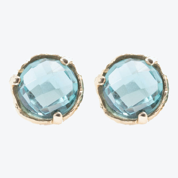 Stunning blue gemstone stud earrings with vintage-inspired gold setting.