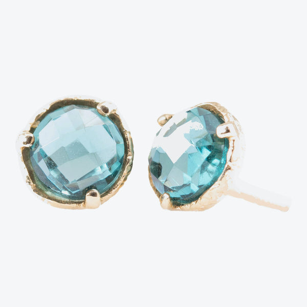 Elegant blue gemstone stud earrings on a gold-toned setting