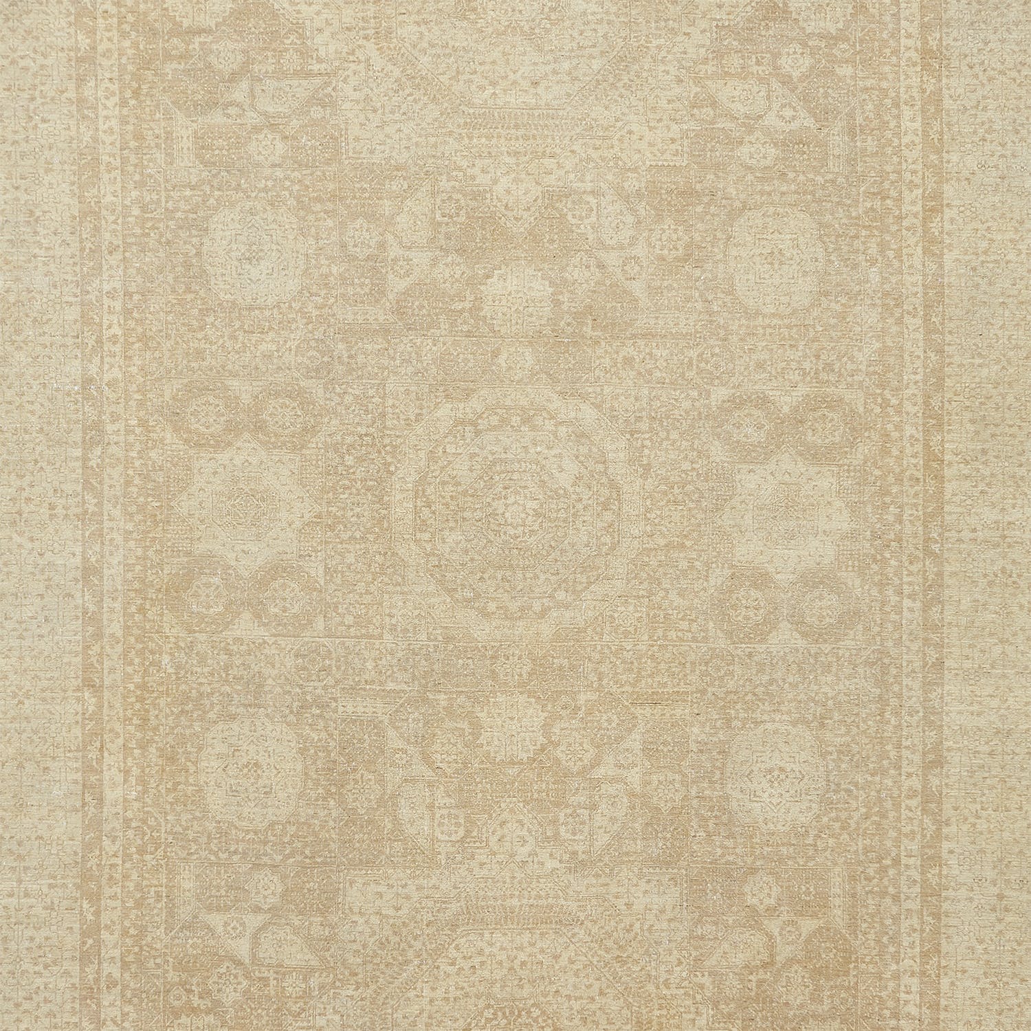 Intricate symmetrical pattern on neutral background evokes classical rug design.