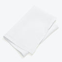 Neatly folded white cloth with no visible patterns or textures.