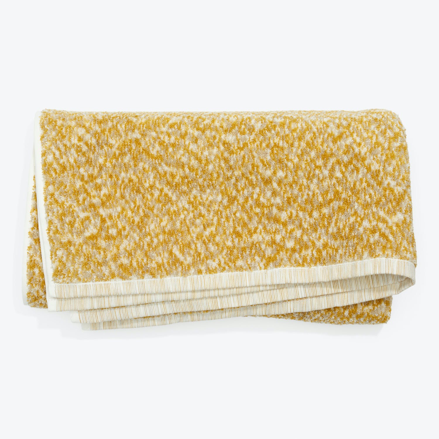 Vibrant yellow towel with striped border showcases textured terrycloth pattern.