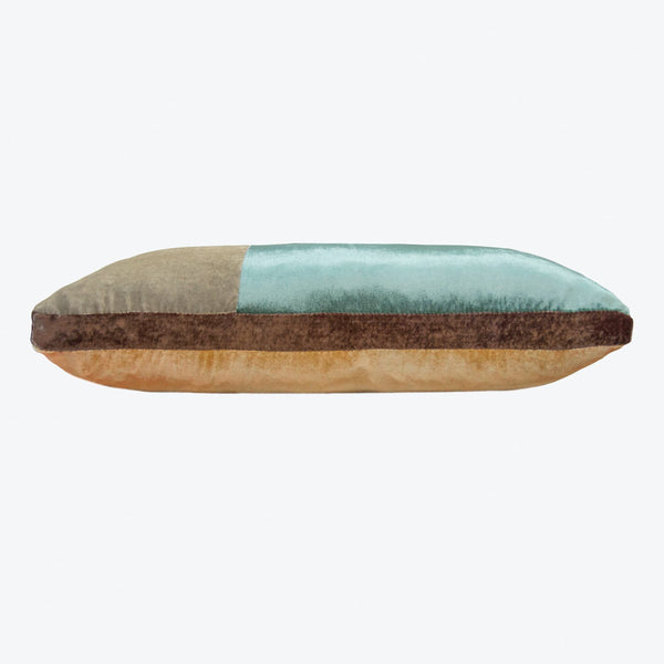 Stylized pencil cushion with colorful sections, perfect as home decor.
